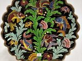 l'image d'une assiette décorative ornée d'oiseaux et de fleurs