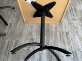 a small table with a black butterfly on it