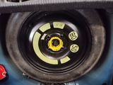 a close up of a tire on a car ' s rim
