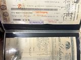 two passports that are sitting next to each other