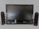 an image of a television set with speakers and a monitor