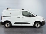 a picture of a white van parked in a parking lot