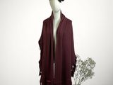 an image of a mannequin with a hat and scarf