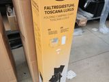 a box that is sitting on the ground next to a pile of boxes
