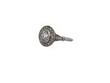 a close up of a diamond ring on a white background