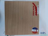 a picture of a piece of cardboard with a sticker on it