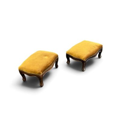 pair of antique foot stools with yellow velvet upholstered seats
