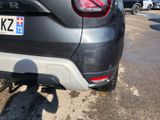a car that is parked on the side of the road