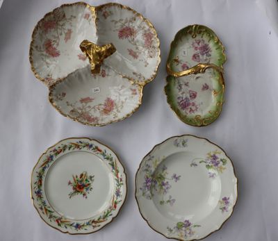 trois assiettes et un bol posés sur une table