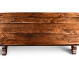 a wooden table with a wooden top on a white background