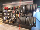 many tires on display in the store for sale