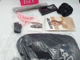 the contents of a hair care kit are laid out on a table