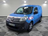 a picture of a blue van parked in a garage