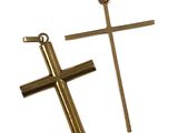 two gold crosses on a white background with a white background