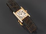 an 18 carat gold wristwatch with roman numerals