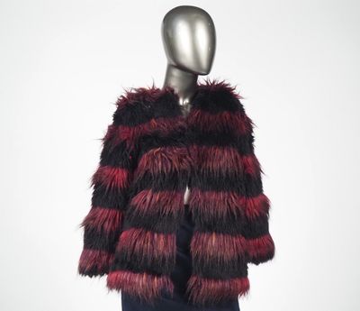 a mannequin mannequin wearing a red and black fur coat