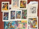 tout un tas de cartes illustrées posées ensemble sur la table