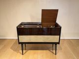 an image of a wooden table with a record player in it