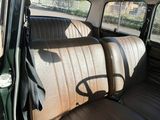 an image of a car with leather seats in the back of it