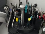 a desk with a bunch of tools on it