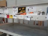 a table with a lot of papers on it in a room