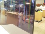 a picture of a large glass display case in a warehouse