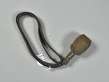 a metal pipe with a wooden handle on a white surface