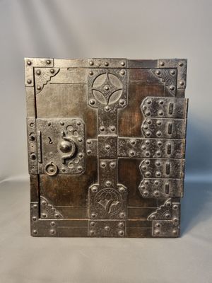 an image of a metal box with a lock on top of it