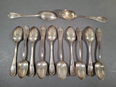 six spoons and two spoons on the table