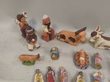 many figurines of different sizes and shapes on the table