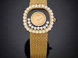 une montre-bracelet pour femme en or et perles