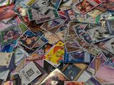 a large pile of cards on the floor of a room