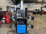 an image of a car being worked on in a garage