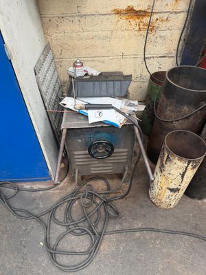 a blue door and a blue door with a bunch of wires on it