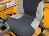 a close up of a seat on a construction vehicle