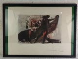 painting of a man and a dog in a black frame on a white wall