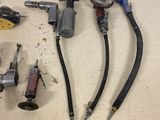 a lot of tools that are laying out on a table