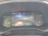 the dashboard of a car with a digital display on it