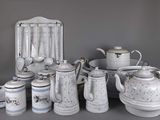 many different types of teapots and coffee pots on the table