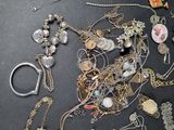 many different types of jewelry on the table
