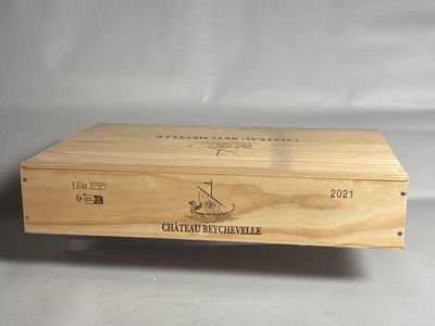 l'image d'une boîte en bois sur laquelle figure un logo