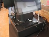 an image of a cash register machine in a store