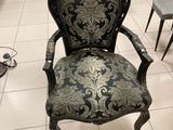 a chair that is sitting on the floor in a room