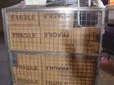 a cart that has a lot of boxes on top of it