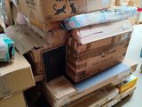 many boxes stacked on top of each other on a pallet