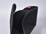 a black hat that has a wooden buckle on it