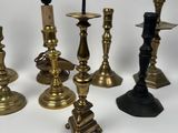 a lot of candles that are sitting on a table