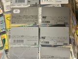 a lot of tickets sitting on top of a table