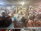a glass case with a lot of items in it