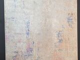 a large piece of fabric hanging on the wall